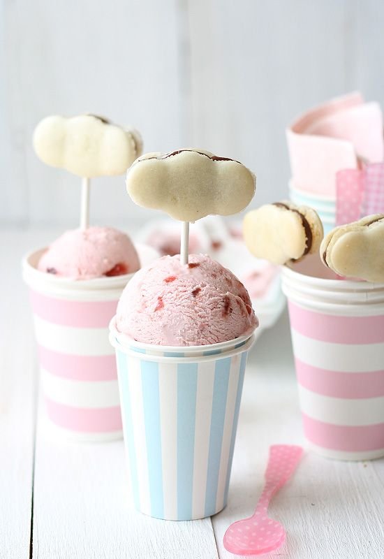 ice cream with macaroons clouds on spades planted in