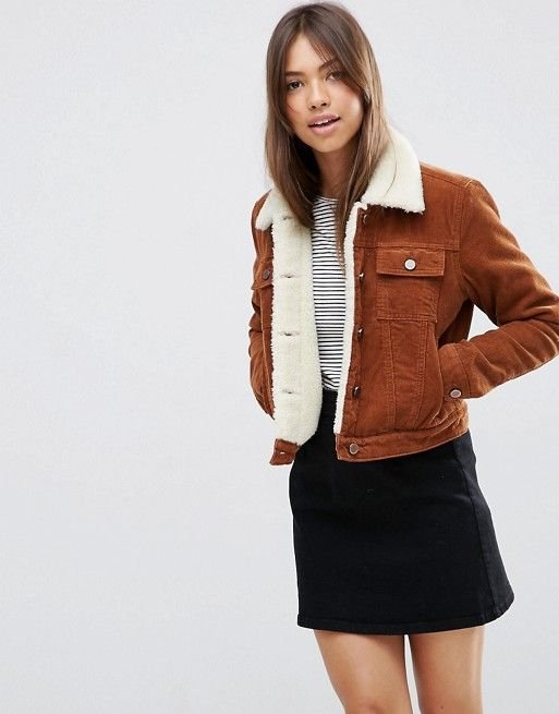 Brown jacket aviator style and mini black skirt