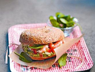 Guacamole bagel, shrimp and spinach sprouts