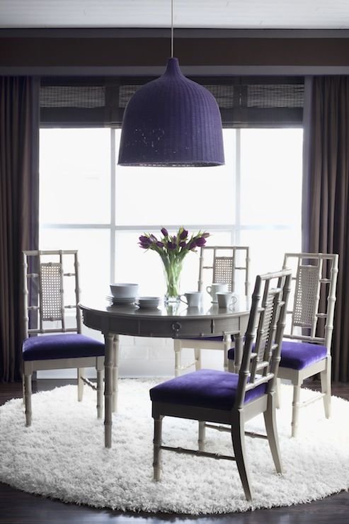 living room with chair cushions and ultra violet chandelier