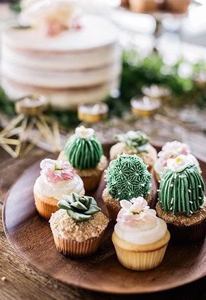 cupcakes topped with cactus butter cream