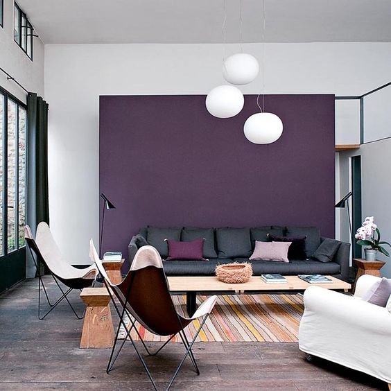an ultra violet living room wall and the others white