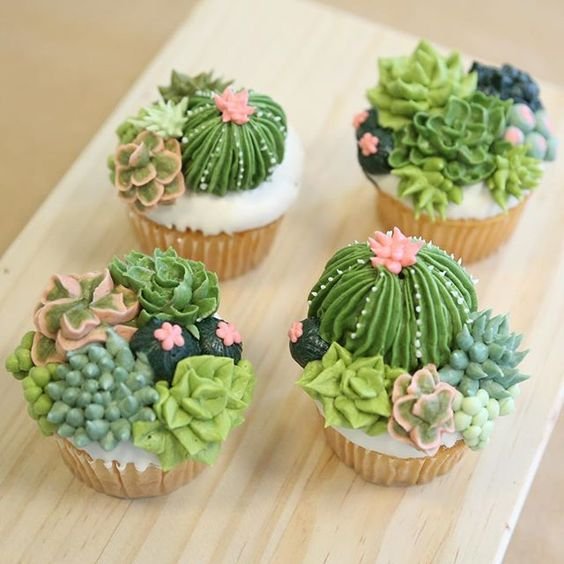 cupcake with cactus in butter cream