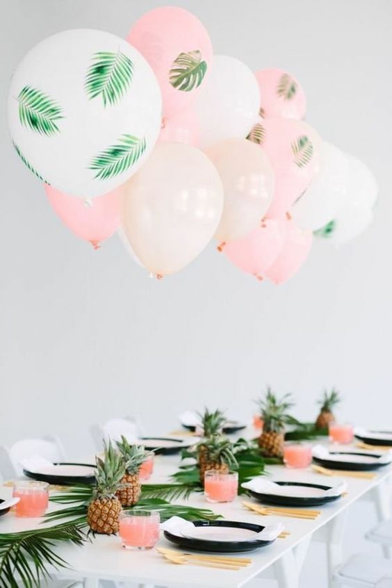 colorful balloons hanging over the table