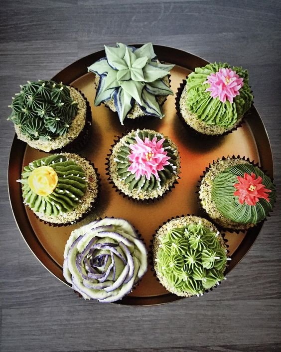 cupcakes decorated with flower cactus in sugar paste