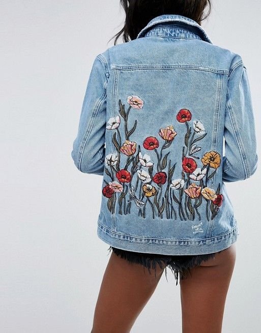 embroidered poppies on the back of a jean jacket