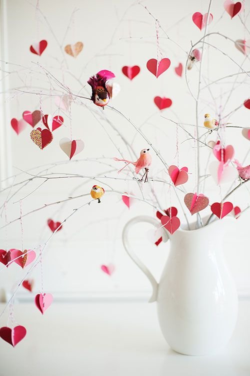 branches with paper hearts hanging on them