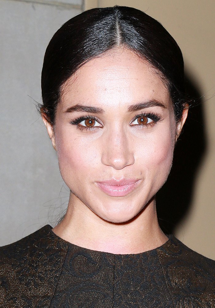 The tied hair of Meghan Markle