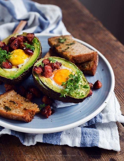 avocados with an egg yolk in it