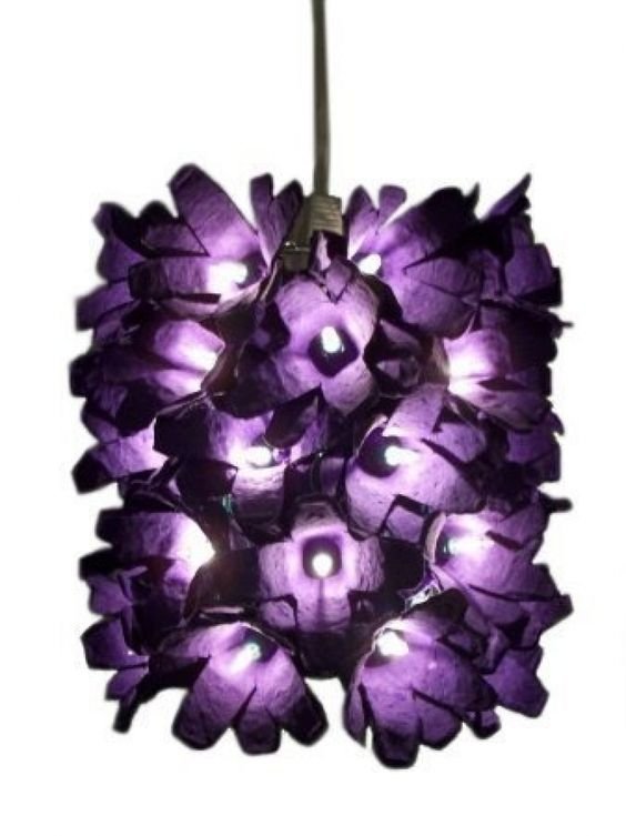 a lamp like a bouquet of flowers with bulbs in cardboard shells
