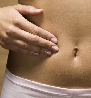 Anti-cellulite massage to have a flat stomach