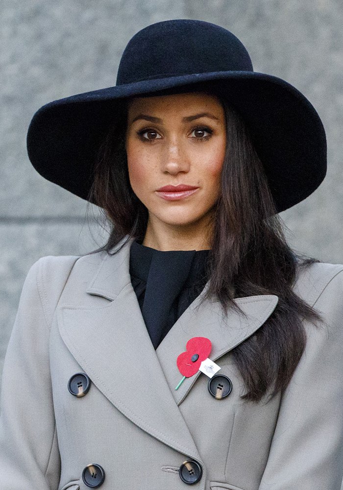 Meghan Markle and her capeline