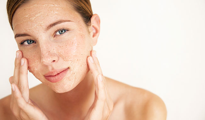 woman peeling to strengthen defense and exfoliate pollution beauty