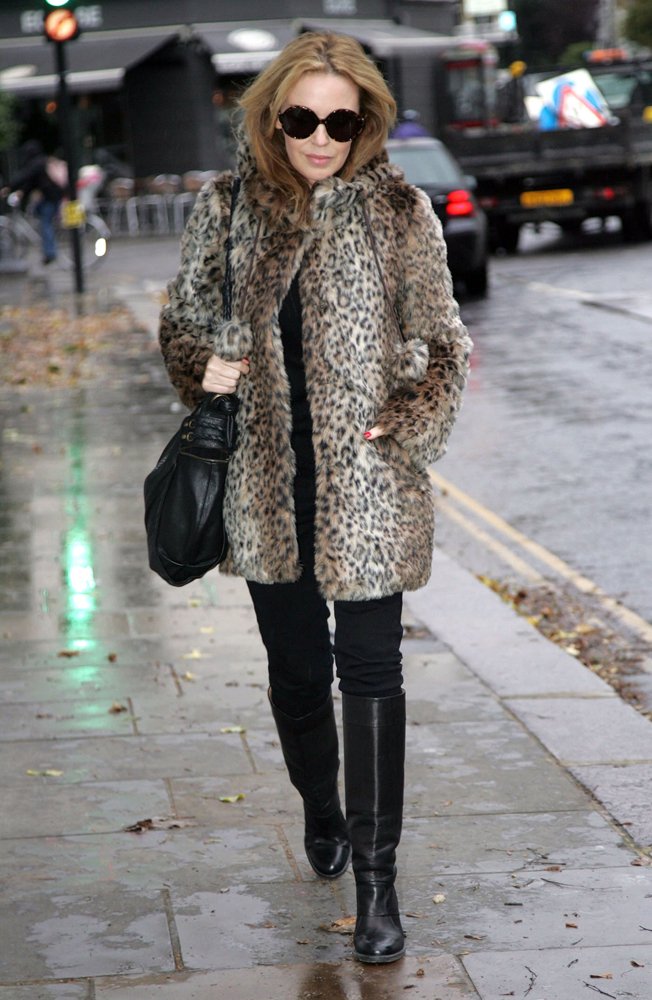 Kylie Minogue in leopard fur coat